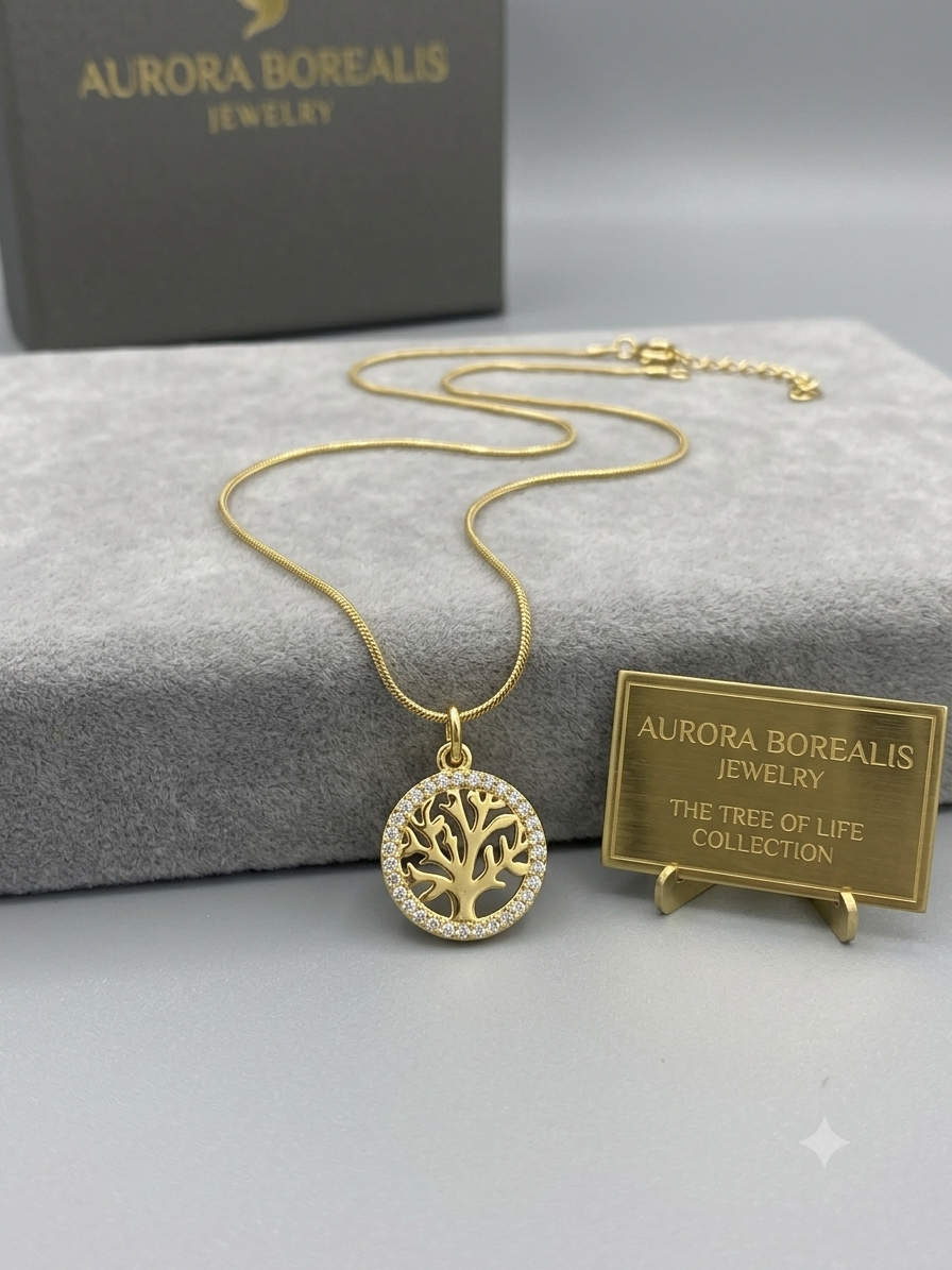 Gold snake chain with double strawberry pendant on display bust