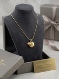 Golden Apple, Tree of Life, Double Strawberries, Pave Lightning Bolt pendants