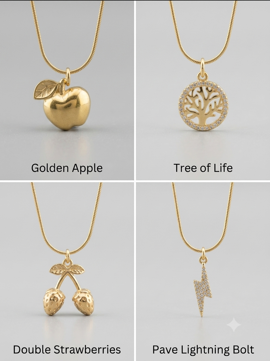 Gold snake chain with Tree of Life pendant on display