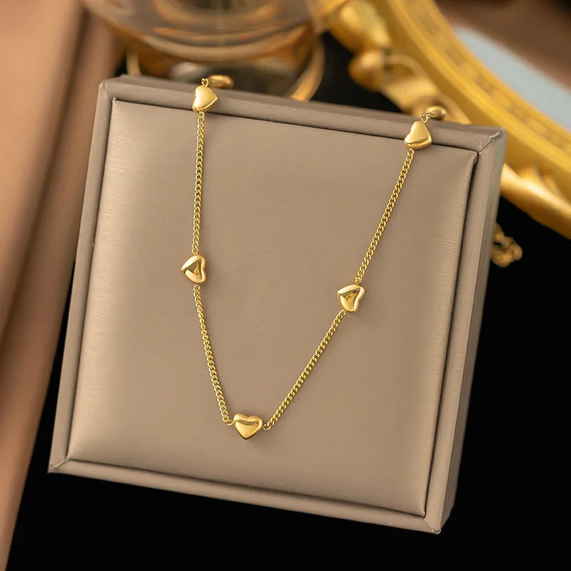 Gold Puffy Heart Station Necklace